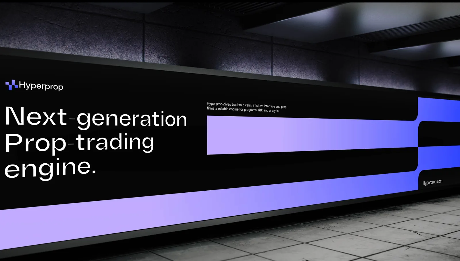 Large Hyperprop billboard in an underground station reading “Next-generation prop trading engine.”